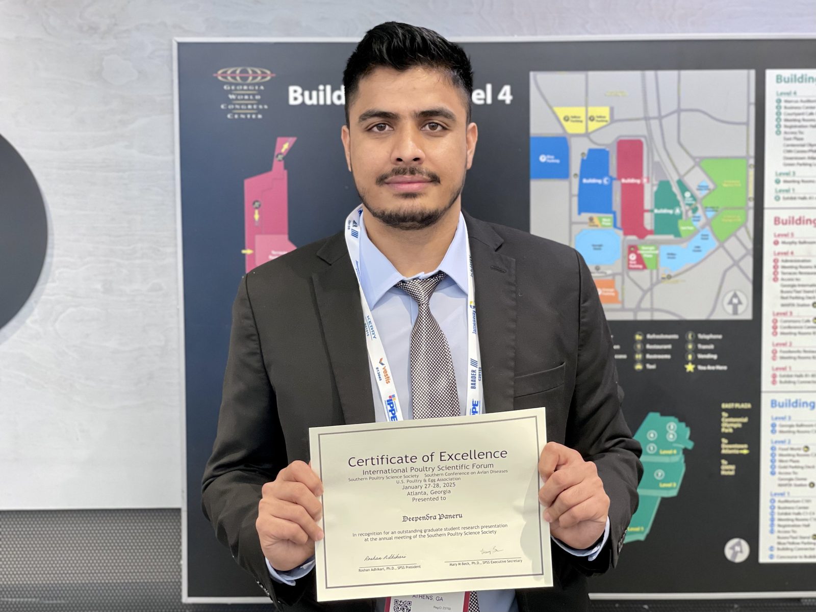 Deependra Paneru with an International Poultry Scientific Forum Certificate of Excellence