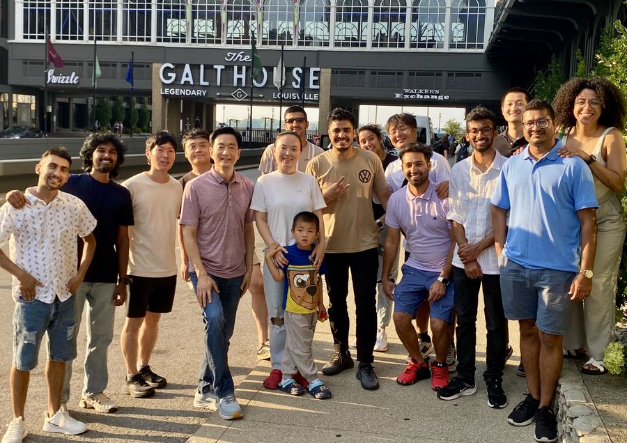 Lab group outside the Galt House in Louisville